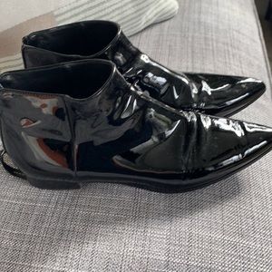 Miu Miu patent leather black bootie. To small for me.